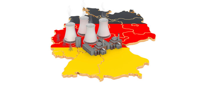 Auf einer Deutschlandkarte sind kleine Kraftwerke abgebildet.