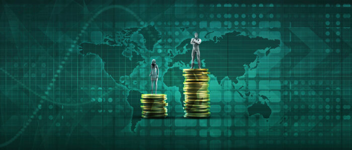 A female and male statue are standing each on their own staple of coins. The staple man's staple is double as high as the woman's. You can see a digital map of the wold in dark green in the background..